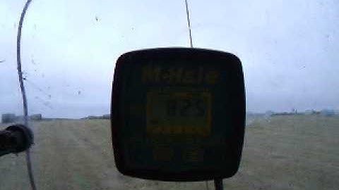 Wrapping bales Holm Farm Stornoway MF390T