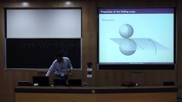 Rolling Symmetric Spaces Krzysztof Krakowski, Luís Machado, Fátima Leite