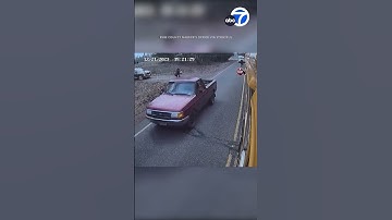 Driver caught on video speeding around stopped school bus as kids exited vehicle