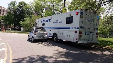 NYPD Central Park Police Smartcar and A NYPD Mobile Command Post Parked In Central Park North