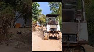 DUMP TRUCK AND BULLDOZER WORKING