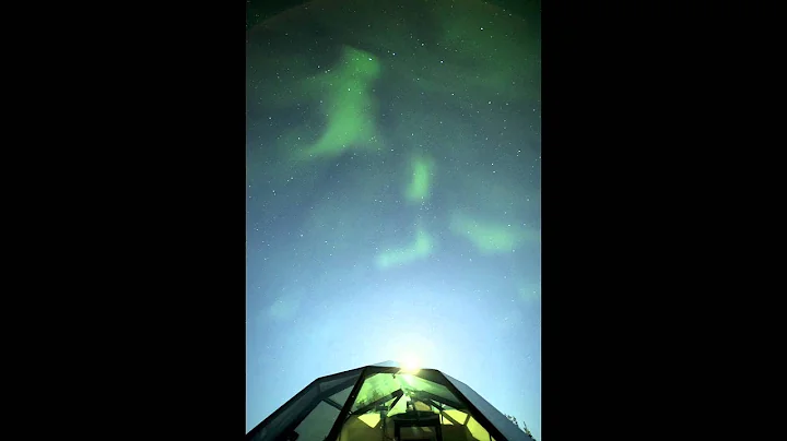 Auroras over the Glass Igloos of Finland