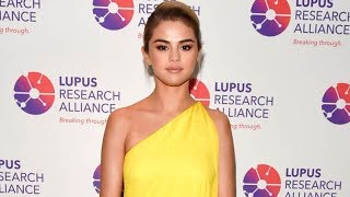 Selena gomez gives emotional speech about "life or death" struggle
with lupus at research event