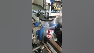 Cone bottle labeling machine #labelingmachine #bottlelabelingmachine #labeler #conelabelingmachine