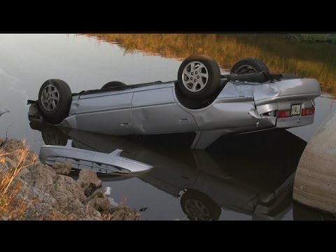 Dad charged after kid crashes car into canal, baby inside