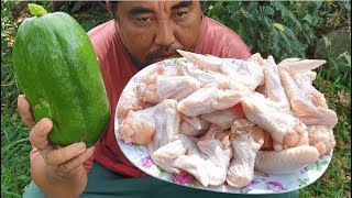 Yummy fry chicken wings with pickle papaya salad - eating delicious Yummy fry chicken wings with pickle papaya salad - eating delicious