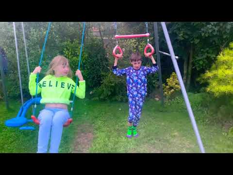Thomas on the rings & Zoe on a swing