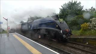 60007 Sir Nigel Gresley passes Helsby station in Cheshire 23rd May 2024