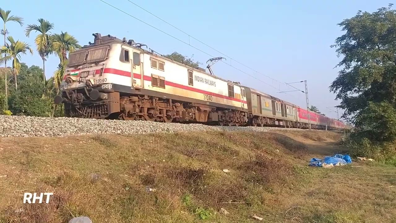 Late running 20504 Dibrugarh Rajdhani Express at full speed towards Moranhat |NFR|.