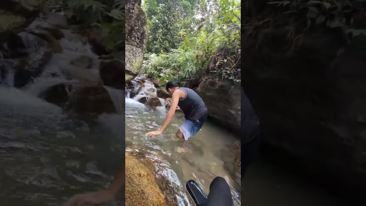 Friend panics over phone after slipping in shallow stream at Mount Pulai, Malaysia