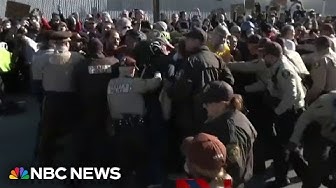 Thumbnail for Officers hospitalized after clashes outside ICE facility