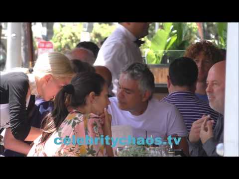Andrea Bocelli receives a gift while eating lunch in Beverly Hills 