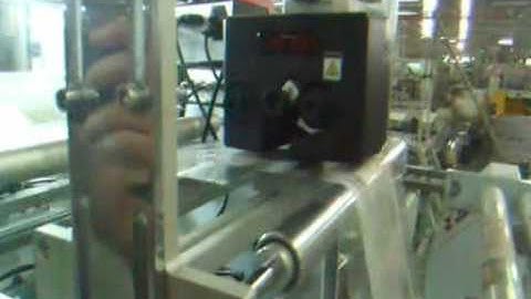 Dikai DK 801 intermittent hot ink roll coder on intermittent packaging machine