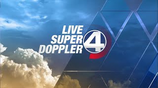 Cloudy and cooler tomorrow