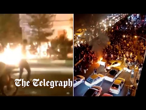 Iranian security forces crack down on angry anti-government protesters