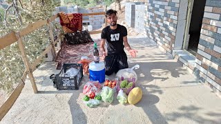 Ali in the rugged mountains; great joy as food arrives and construction of dream hut continues