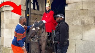 Armed Police Confronts a Man Harassing the King’s Horse