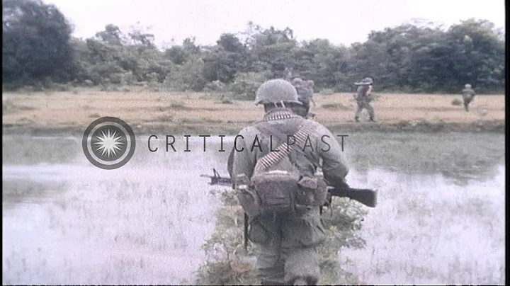 United States soldiers of 1st Infantry Division advance forward towards a battlef...HD Stock Footage