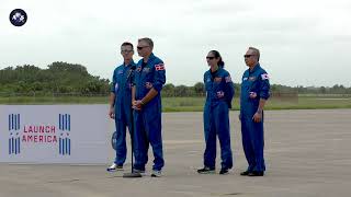 Crew-7 mission members arrive at KSC and answer questions from the attending media.