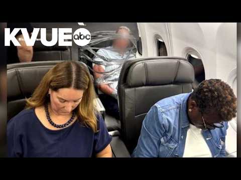 Disruptive passenger duct-taped to plane seat