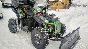Polaris SCRAMBLER 1000 s plowing snow