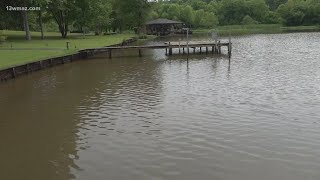 Residents who live near Lake Sinclair express frustations behind silt and sendiment build up