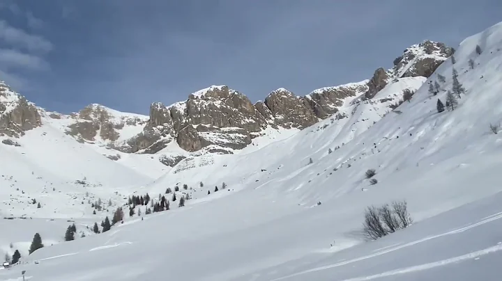 Guiding easy ski mountaineering in Dolomites Passo...