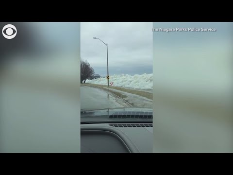 Strong winds blow Lake Erie ice over wall | 10News WTSP