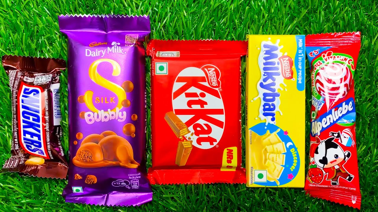 ASMR: Unboxing a Giant Mystery Box Full of Candy chocolate rainbow lollipops Satisfying video