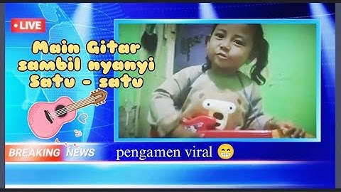 Bermain gitar sambil nyanyi