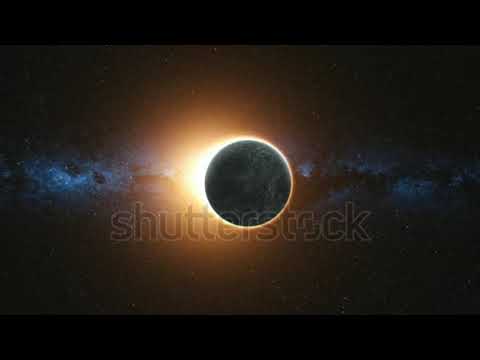 Full solar eclipse. The Moon mostly covers the visible Sun creating a gold diamond ring effect. 