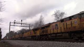 UP 8161 leads NS 28J through CP Ardrey in DeArmanville, AL