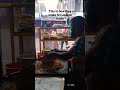 Local man making a Sri Lankan Kottu in style