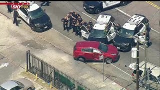 Pursuit suspect taken into custody after bizarre chase