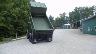 m929 green military dump truck C&C Equipment 812-336-2894 ccsurplus.com