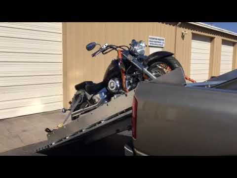 motorcycle master loader lift mountain