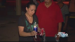 Homicide victims remembered a candlelight vigil
