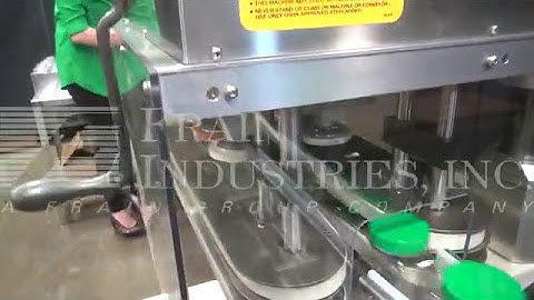 6 Spindle Inline Capper Demonstration Running Plastic Jars