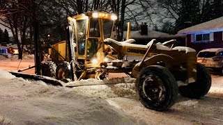 After a snow storm with almost 20cm ( 8 inches ) the grader is
dispatched to clear residential streets of snow. champion 740 grader.