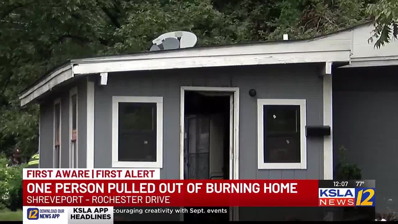 Person pulled out of burning home - YouTube