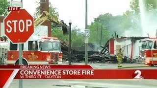 Emergency demolition begins following fire at convenience store in Dayton