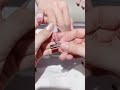 Sparkling Silver French Manicure with Flowing Gold Accents