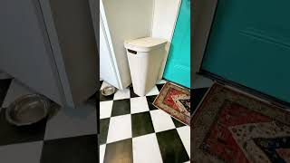 tall slim laundry hamper designed for small spaces that helps keep laundry contained while making
