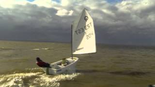 Sailing on Optimist. Wind up to 35 knots.  (Optimist planing)