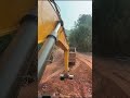 Excavators Load Soil Onto Trucks