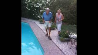 Father an daughter discover water in pool