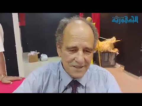 الباحث عبدالقادر بن دعماش يعرض خلال الدورة14للجمعية الوطنية كاكي الذهبي كاتبه الحاج أمحمد العنقا