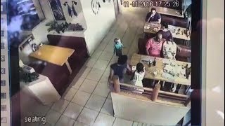 Caught on film: Stranger snatches child at restaurant