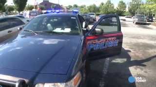 Police: Mom left 4 kids in hot car while shopping