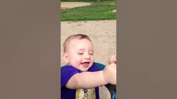 Liam's first time on a swing